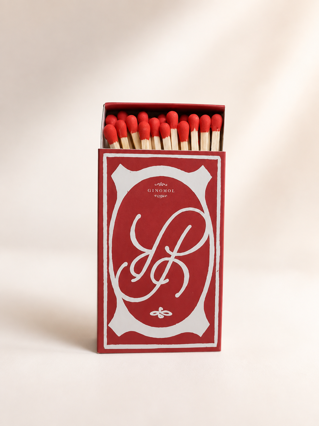 Open red custom branded matchbox with white matches