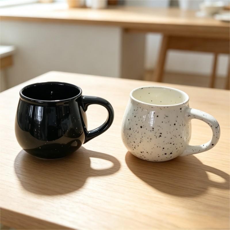 Black and White Speckled Round Ceramic Mugs Pair