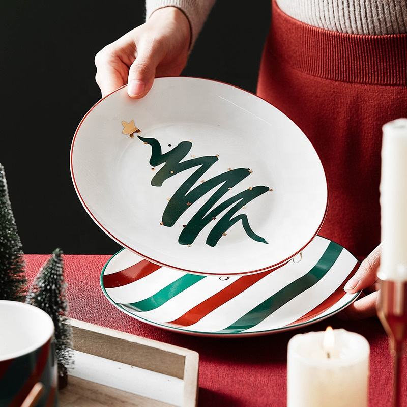 White Ceramic Plates with Hand-Painted Christmas Tree and Stripe Design