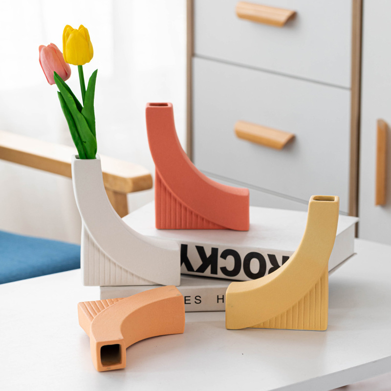 White Coral and Yellow Curved Ceramic Vases with Tulips